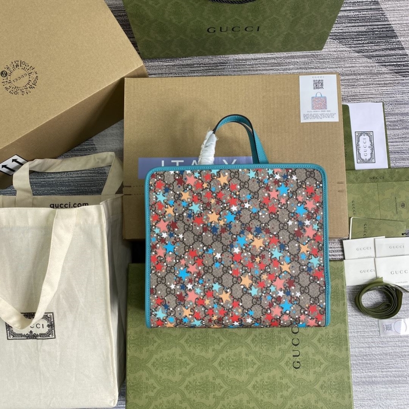 G*u*i shopping bags